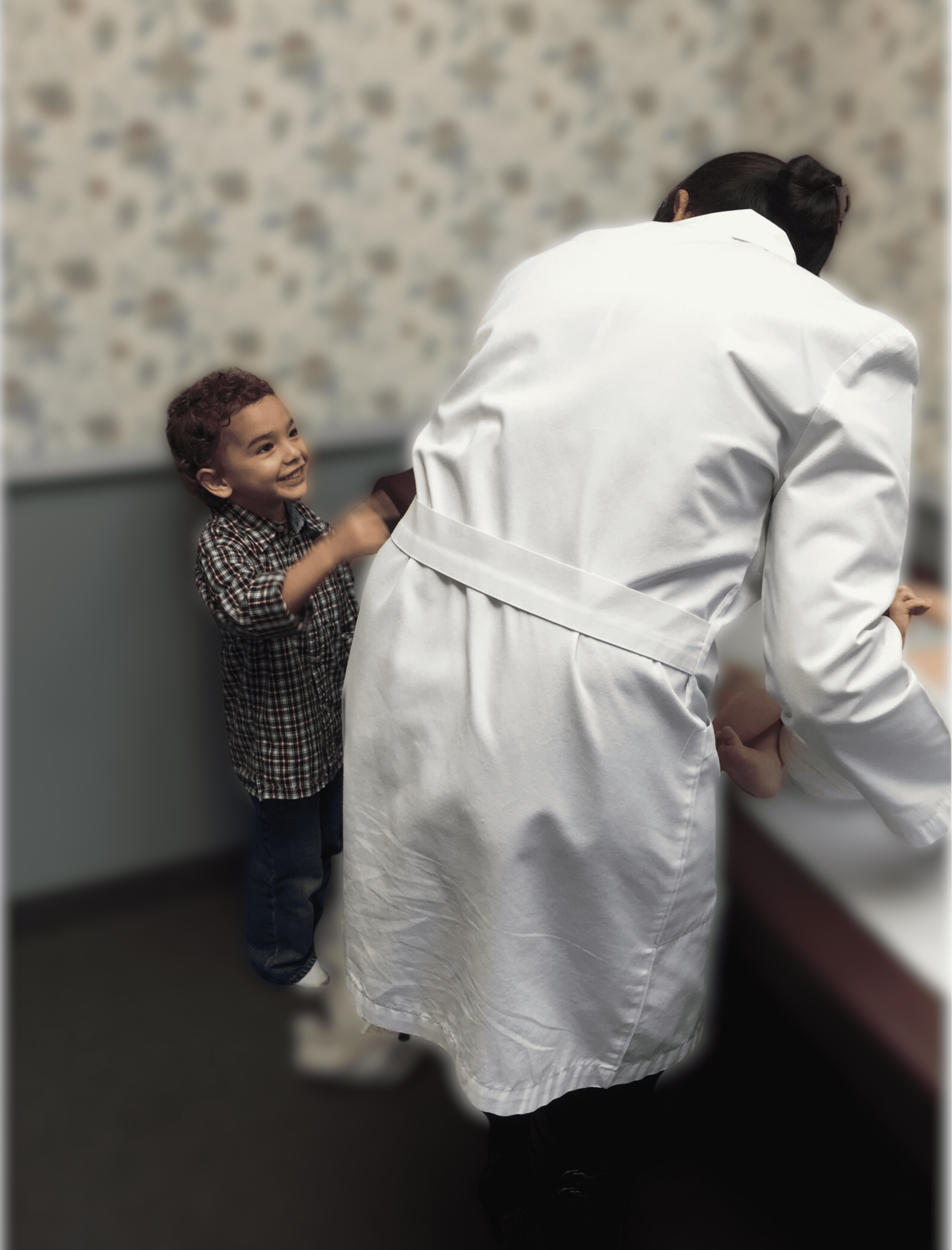 Doctor and a Boy Talking in a Room